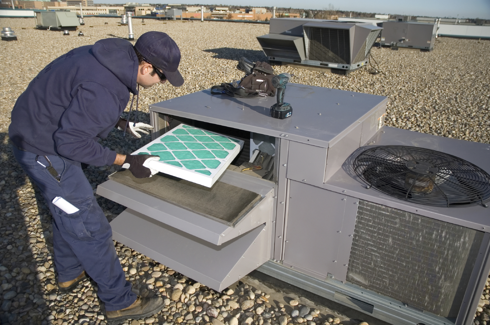 Inspecting Roof Top Unit