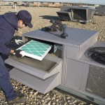 Inspecting Roof Top Unit